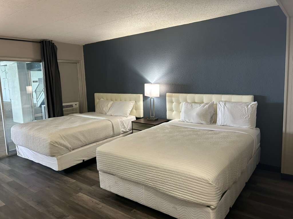 Double Queen Room at SWMI Hotels, fits up to 4 guests